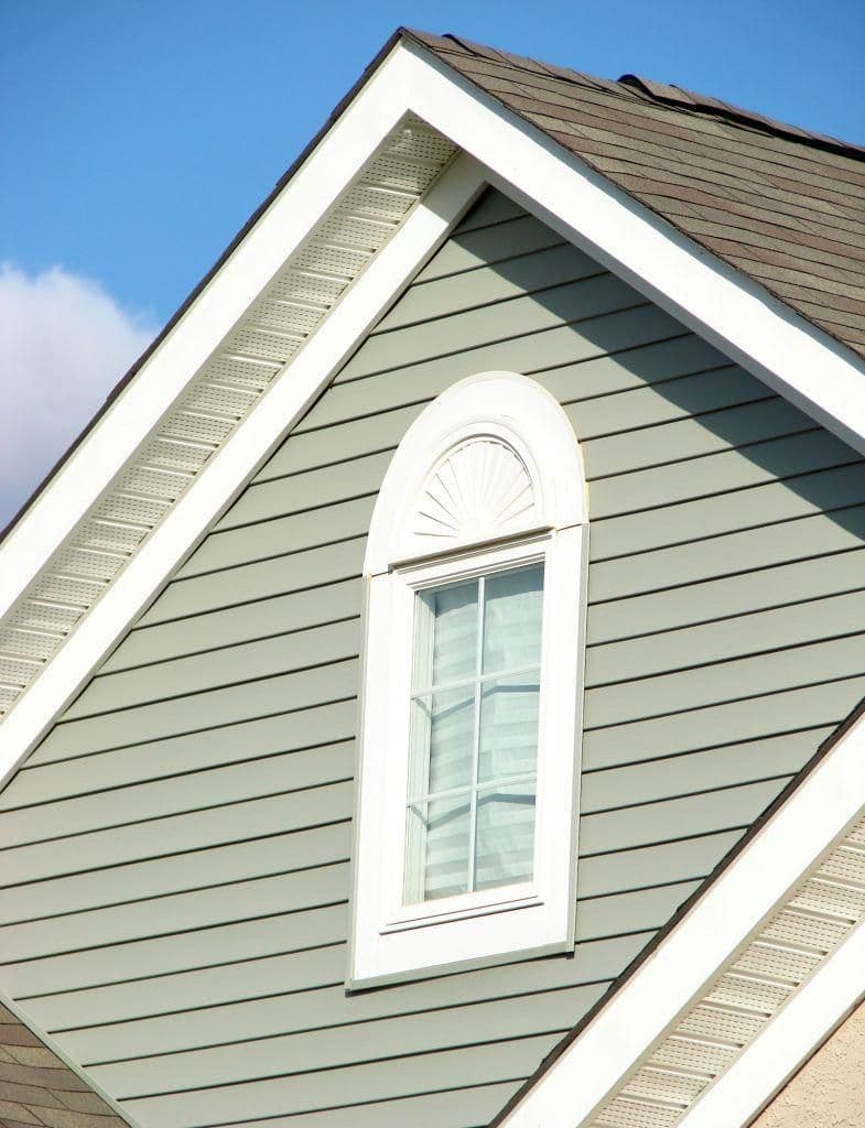 bigstock-House-Gable-over-Blue-Blue-Sky-975041-785x1024.jpg